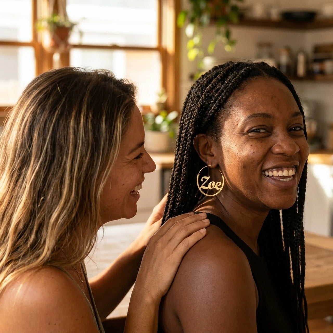Custom Name Hoop Earrings in Gold, the moment the gift is given between two friends | SKU: name-hoop-gold-30-mm