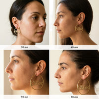 Thumbnail for Custom Name Hoop Earrings worn in the four sizes, 30, 40, 50 and 60 mm, shown on the ear