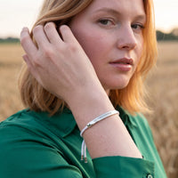 Thumbnail for White string bracelet — worn, everyday gesture, silver | SKU: laperle-wg