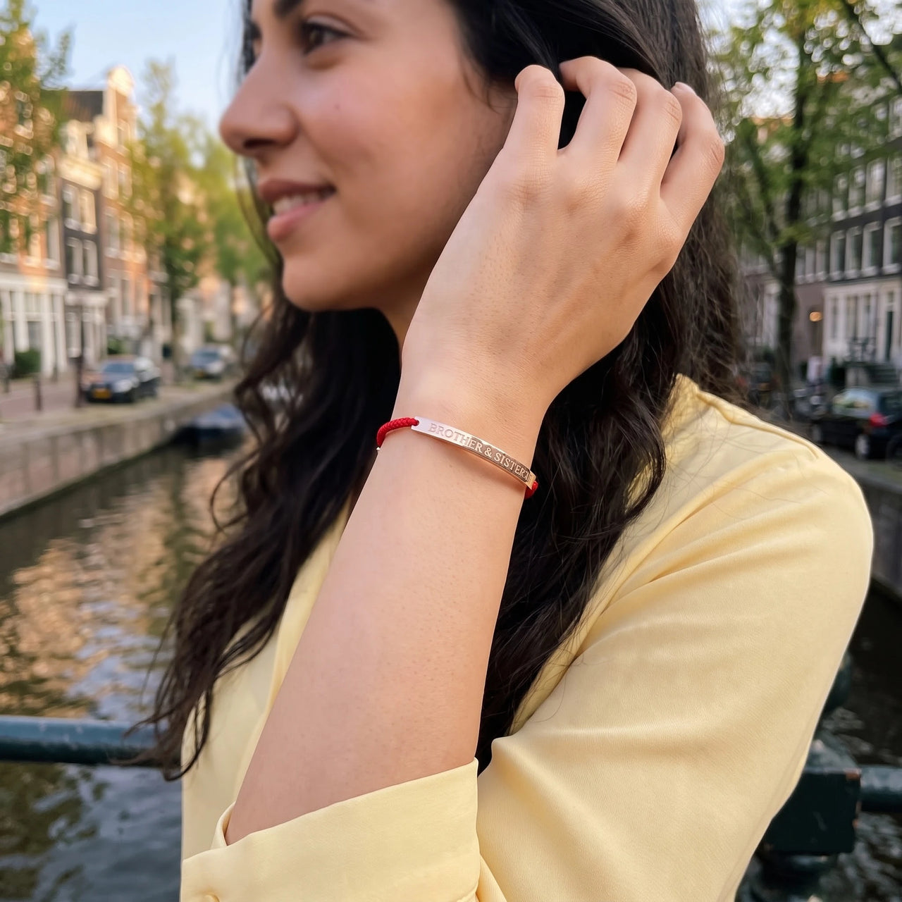 Red rope bracelet — worn, everyday gesture, rose gold | SKU: lamour-rg