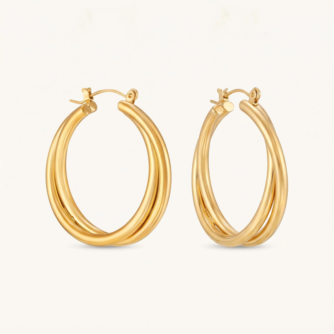 Double hoop earrings — product photo on a white background, gold | SKU: lescroisees