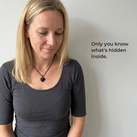 Thumbnail for Woman wearing the black heart pendant, black on the outside, only she knows the photo inside | SKU: TPH-CHTN-BLACK-SMALL