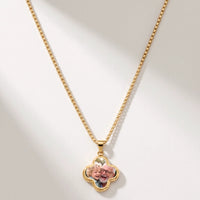 Thumbnail for Secret Clover Photo Necklace in gold, four-leaf clover pendant on a box chain showing the hidden photo | SKU: TPH-CLVN-GOLD