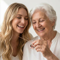 Thumbnail for Grandmother and granddaughter laughing over the photo in the rose gold heart necklace | SKU: TPH-HRTN-ROSEGOLD