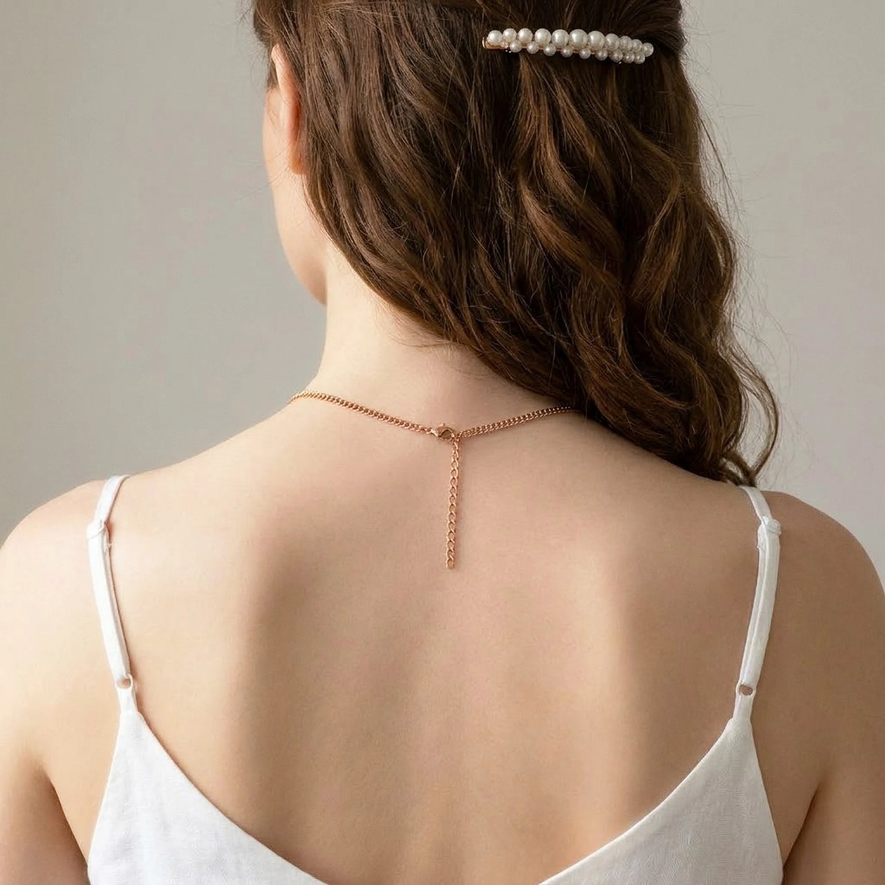 Back of the neck showing the lobster clasp and extension chain of the rose gold photo necklace | SKU: TPH-RNDN-ROSEGOLD